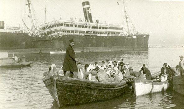 Refugee evacuation associated with Near East Relief; archive photograph.