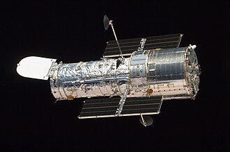 Hubble photographed from Atlantis after the 2009 servicing mission.