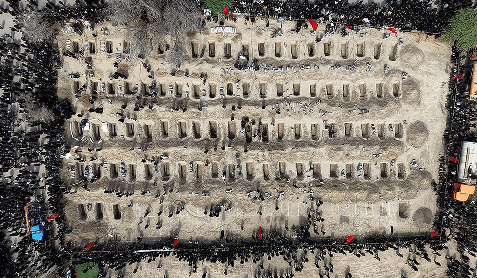 Graves for victims of the Minab school attack.