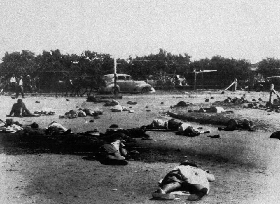 People killed or wounded after police fired at Sharpeville in 1960. This historical photograph shows the aftermath of violence.